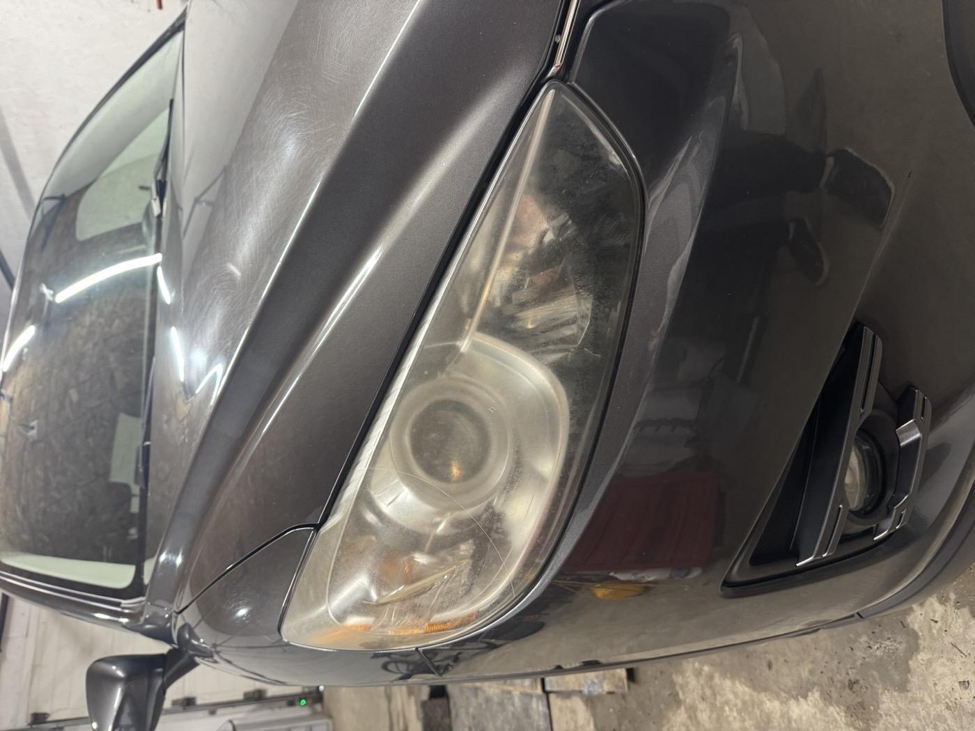 Cloudy headlight before restoration